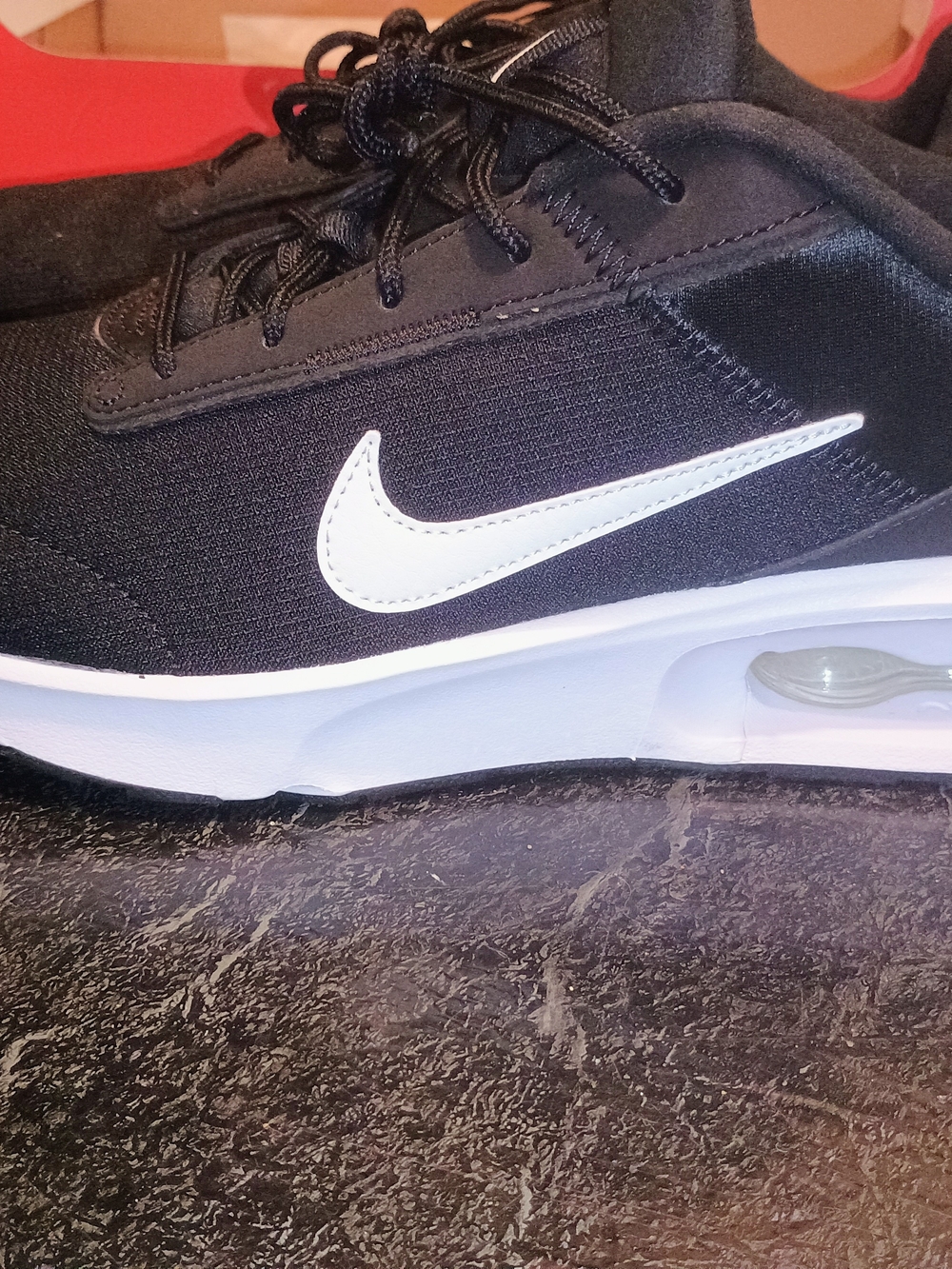 Nike Women's Black/White Air Cushion Sneaker